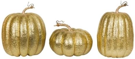 Vickerman 8" Gold Pumpkins Assorted Set of 3. Three Pieces Assorted, Sizes: 9"(W) x 8"(H),7.5"(W) x 8"(H), 6.25"(W) x 8"(H). Fabric Pumpkin with styrofoam Inner. by Vickerman