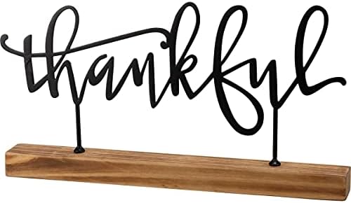 Primitives by Kathy Decorative Sitter, from our Fall & Harvest Collection featuring a metal sign boasting an inspirational word standing on a natural wood base. Hand lettered "Thankful" sentiment is perfect for everyday and seasonal use. by PrimitivesbyKathy