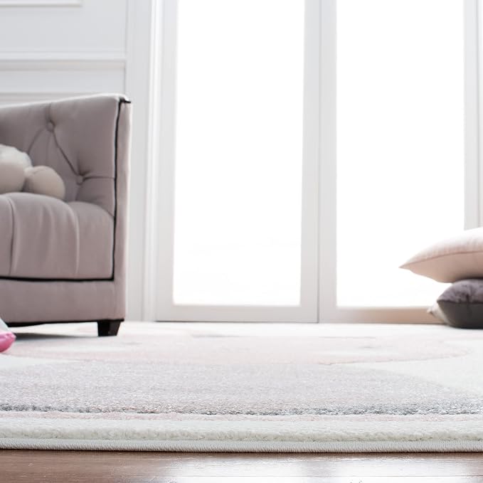 SAFAVIEH Carousel Kids Collection Area Rug - 5'3" Square, Ivory & Pink, Bunny Design, Non-Shedding & Easy Care, Ideal for High Traffic Areas for Boys & Girls in Playroom, Nursery, Bedroom (CRK166A)