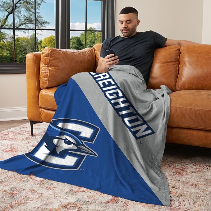 Northwest NCAA Silk Touch Throw Blanket, Ultra Soft Plush Polyester, Lightweight Warm Decorative Fan Gift, 46 x 60 in