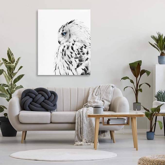 Stupell Industries Snow Owl Peering Blue Eyes, 36 x 48 Inch Canvas Wall Art | Stupell Industries · By Design Fabrikken · Ready to hang · Cabin and lodge decor · Made in USA