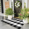 KIMODE Buffalo Plaid Outdoor Rug Runner Doormat 24'' x 51", Black/White Cotton Woven Checkered Fall Farmhouse Porch Rugs, Washable Indoor Door Mat for Front Layered Kitchen Bathroom Laundry Room