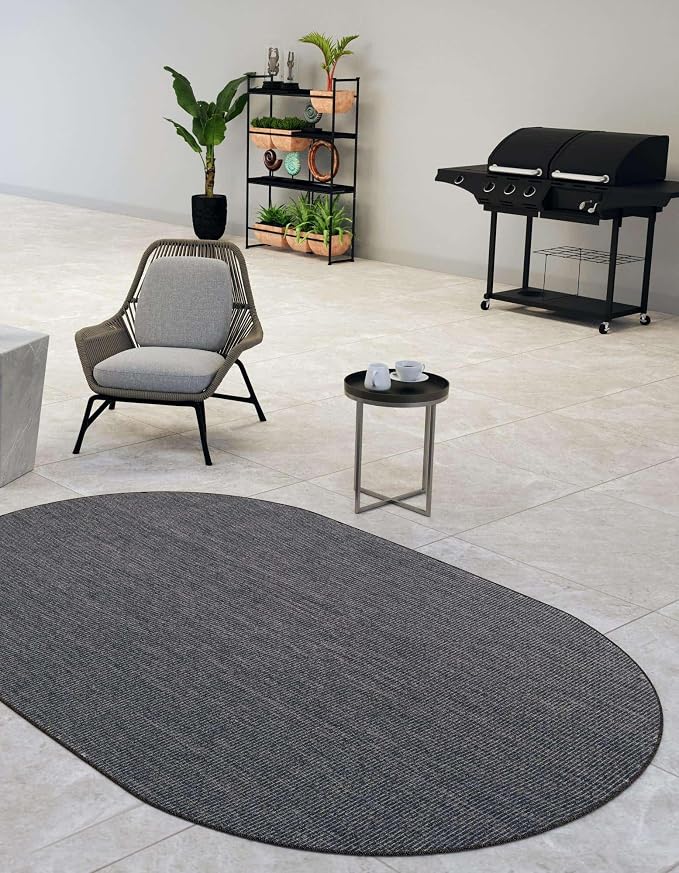 Unique Loom Outdoor Solid Collection Area Rug (5' 3" x 8' Oval Black/Ivory)