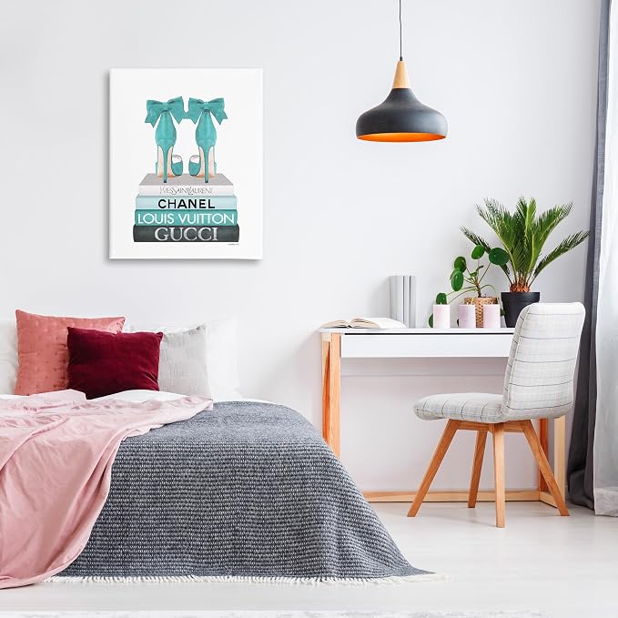 Stupell Industries 'Turquoise Bow Heels on Books', Canvas Art, 30 x 40 Inches, Easy to Hang and Sturdy, Made in USA, by Amanda Greenwood | Stupell Industries | 30 x 40 Inches, Easy to Hang and Sturdy, Made in USA, by Amanda Greenwood