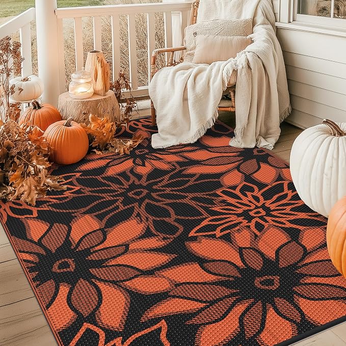 GENIMO Outdoor Rug Waterproof for Patio Decor, 6' x 9' Reversible Plastic Straw Floral Camping Carpet, Large Area Rugs Mats for RV, Camper, Deck, Balcony, Porch, Beach, Picnic, Black & Orange