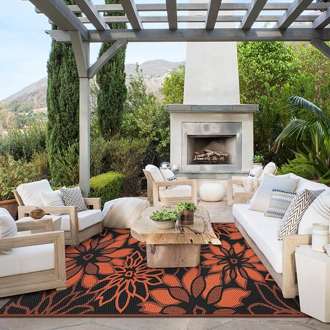 GENIMO Outdoor Rug Waterproof for Patio Decor, 6' x 9' Reversible Plastic Straw Floral Camping Carpet, Large Area Rugs Mats for RV, Camper, Deck, Balcony, Porch, Beach, Picnic, Black & Orange