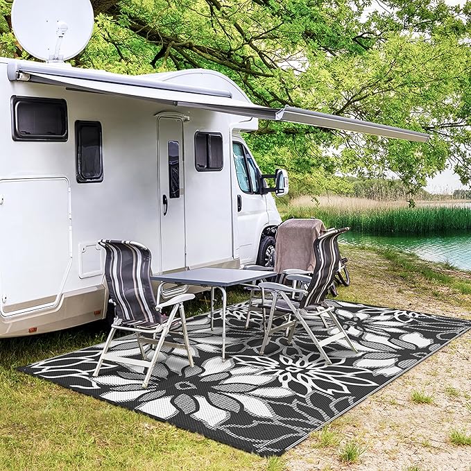 GENIMO Outdoor Rug, Waterproof Plastic Rugs for Patio, 6'x9' Black White | Outside Larger Leaf Carpet Mat for Porch Decor, Deck, Balcony, Camping, RV, Backyard, Picnic, Beach, Reversible, Foldable