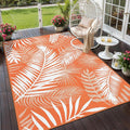 Outdoor Patio Rug, 6'x9' Plastic Straw Waterproof Mat, Reversible Camping Rug for RV Outside,Colorful Outside Layering Rug for Patios, Backyard, Deck, Balcony,Beach, Orange & White
